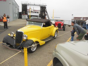 One of many 1932 Ford coupes coming off the MV Coho