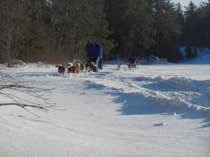 Chris and Ed entering the lake after riding in the woods.