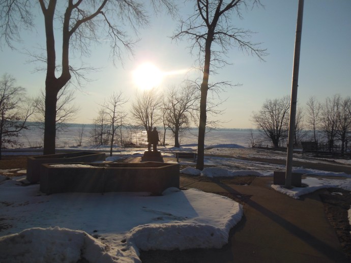 Statute of Joseph Smith and Brigham Young looking west across the Mississippi