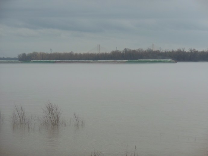Barge traffic in the mist on the Mississippi