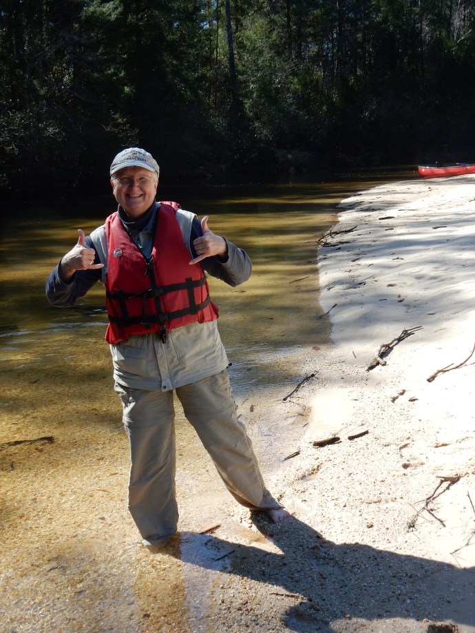 Chris on a sandy beach at our break