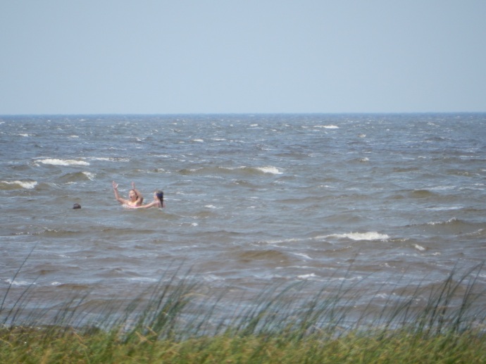 People swimming in Red Lake