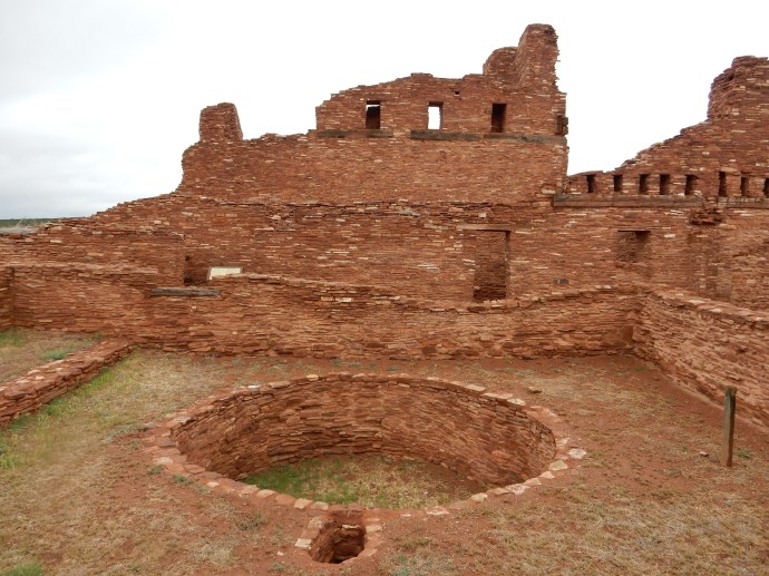 Abo mission ruins. Note the circular kiva in front of the church walls-did the Franciscans accept this Indian practice? Who knows?