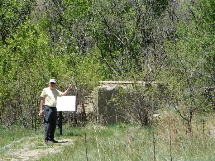Ed inspecting ruins at Sugarite Canyon State Park