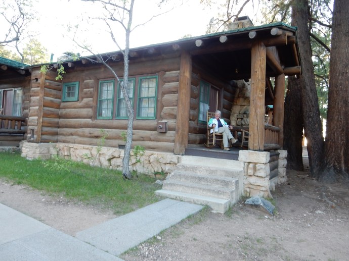 Chris on front porch of our cabin